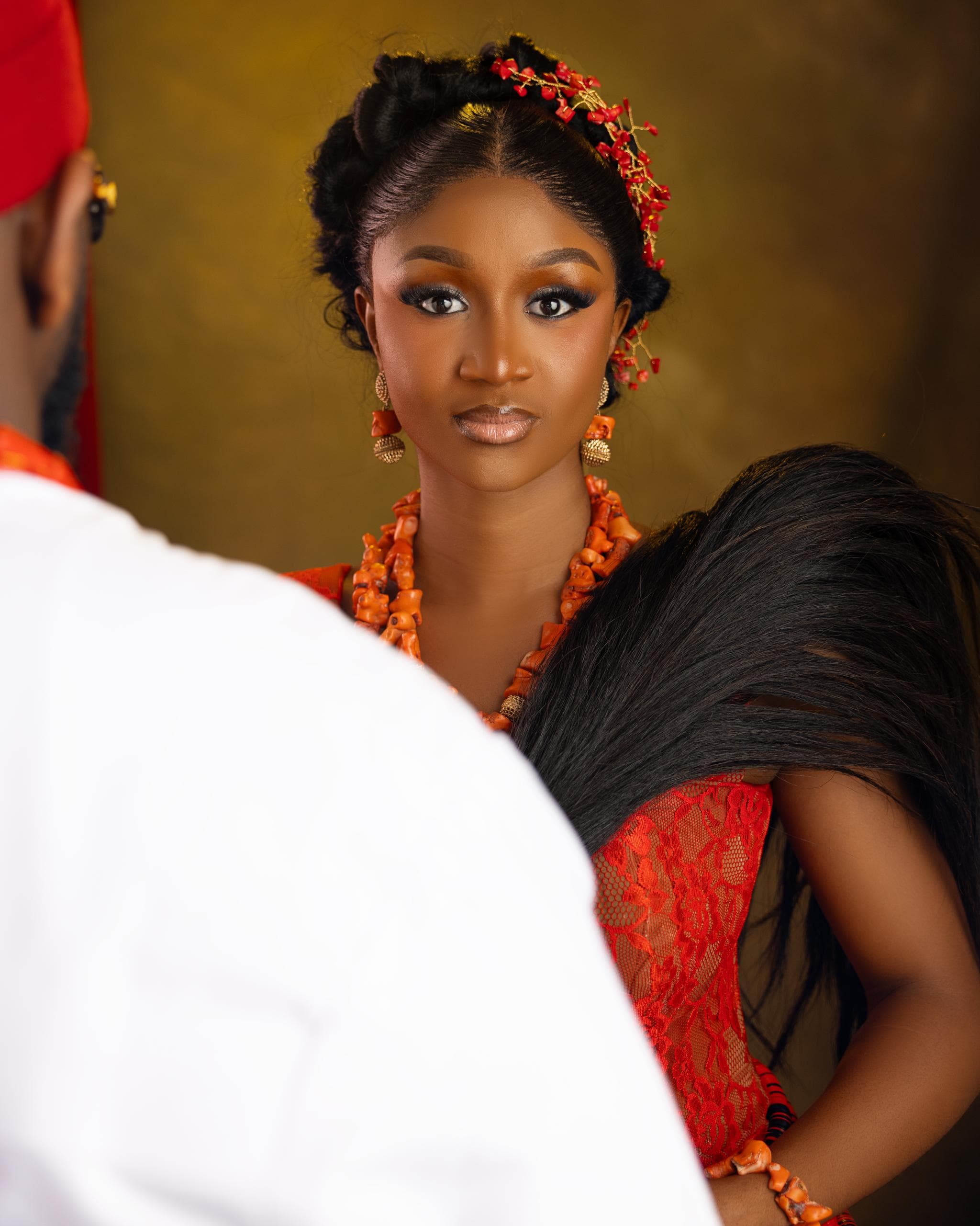Portrait of Gabrielle in red traditional attire